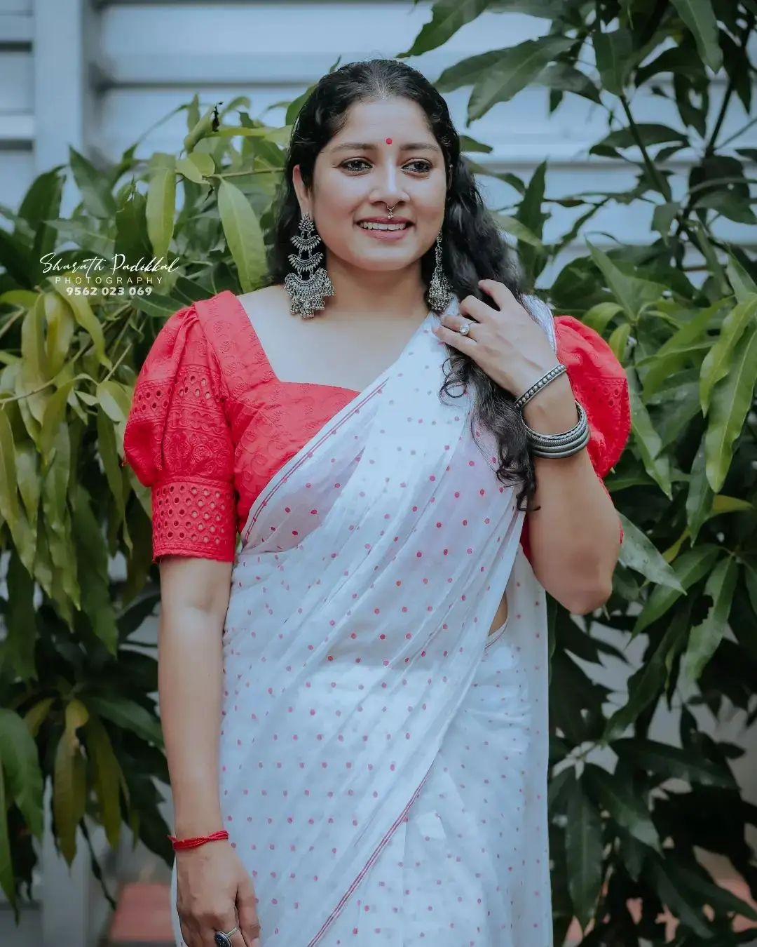 Anumol in White Saree Red Blouse